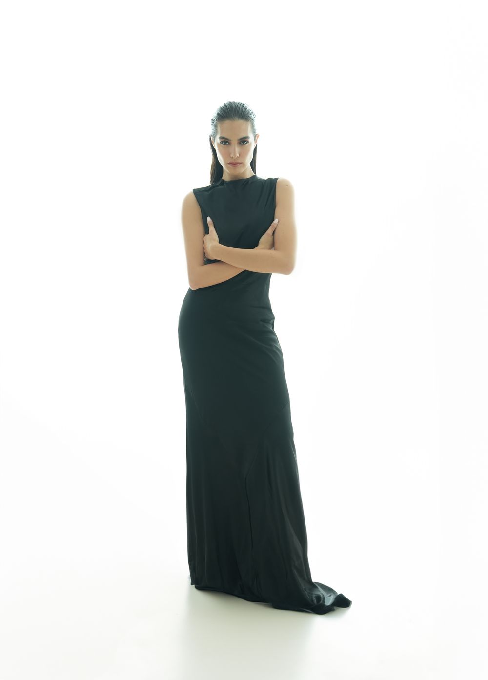 Sharon in a black gown in the studio